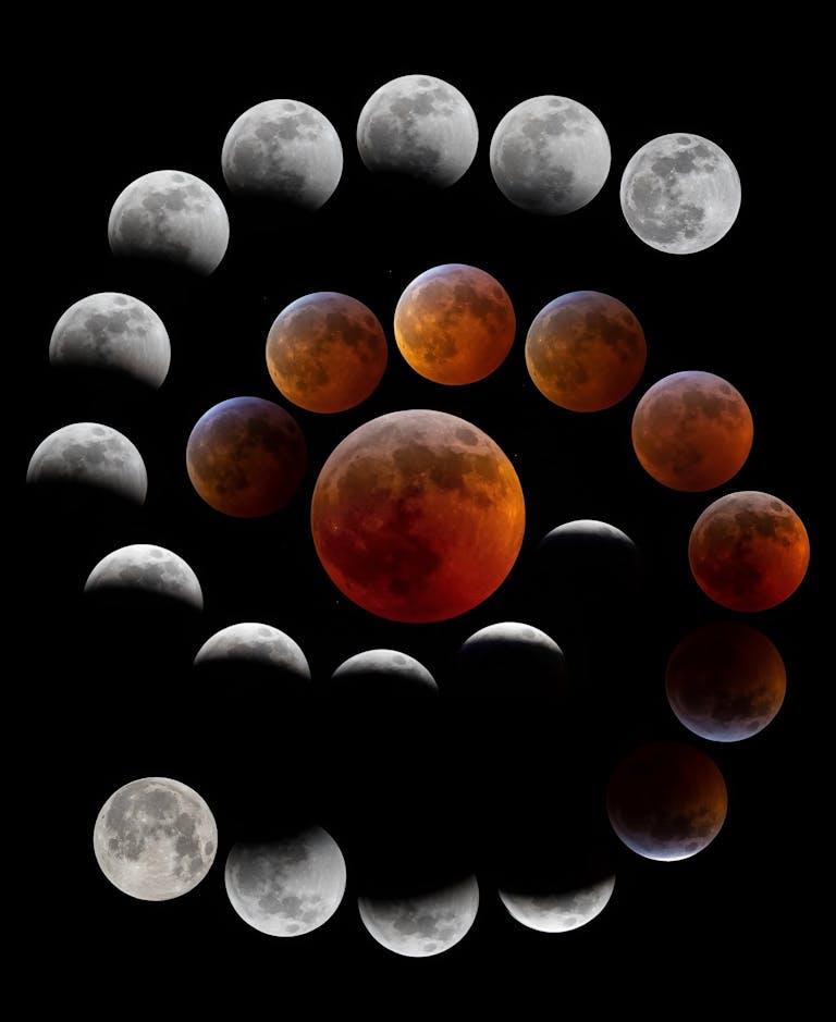 Composite image capturing the dramatic phases of a lunar eclipse against a black sky.